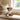 Boyds Bears 45th anniversary Chubs Beanster plush sitting on bench by window