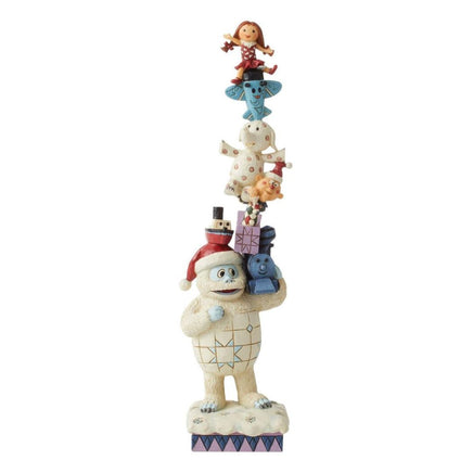 Bumble, the abominable but friendly snowman, is the base of a towering stack misfit toys. Jim Shore Rudolph Traditions Christmas Figurine