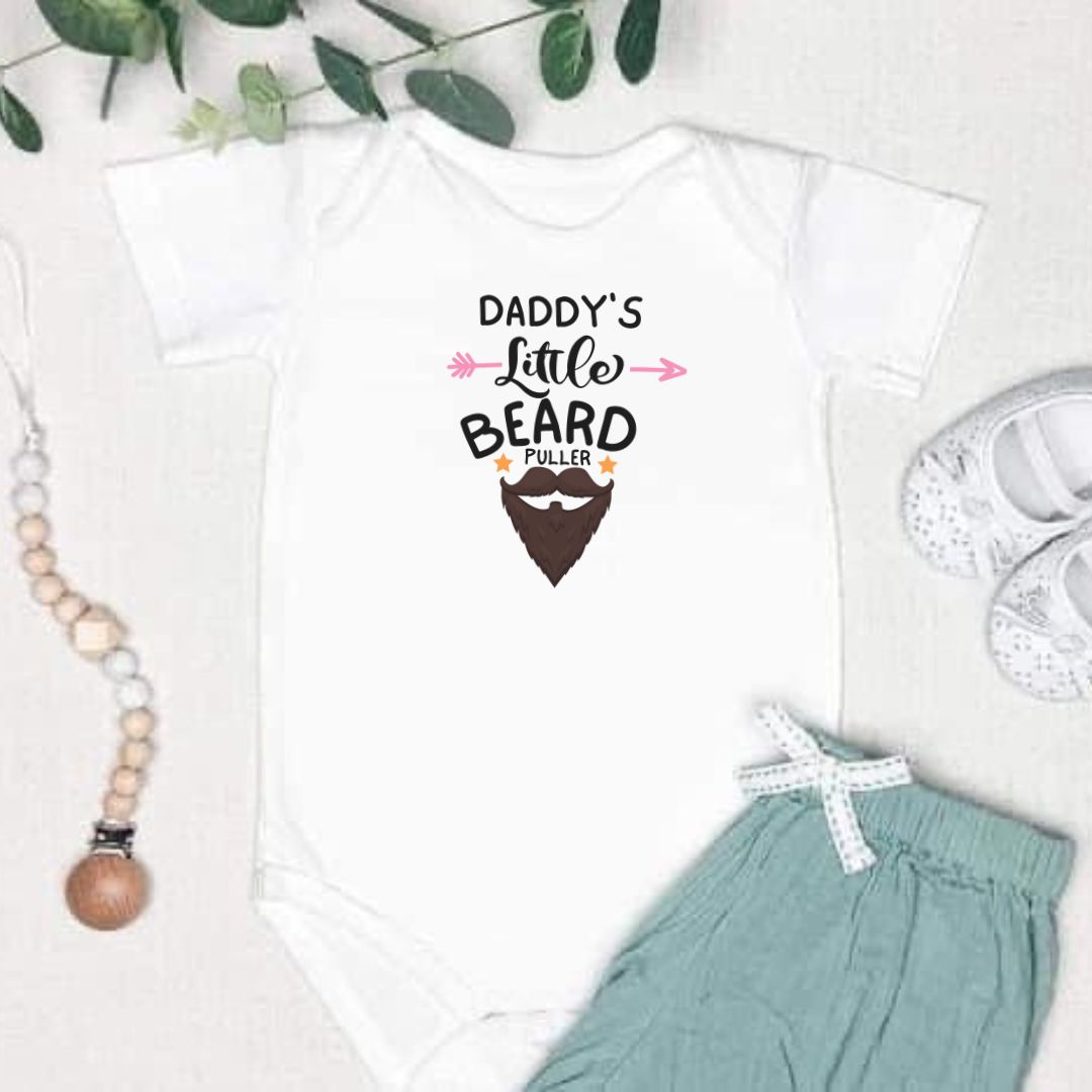 White baby bodysuit featuring 'Daddy's Little Bear Puller' design, ideal for new dads and new babies.