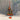 Father and son hunting Christmas ornament featuring hunters in orange safety gear with rifles and hanging shotgun shell accents with a hunting scene background
