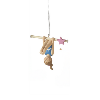 Gymnast_ornament_in_blue_leotard_performing_bar_routine