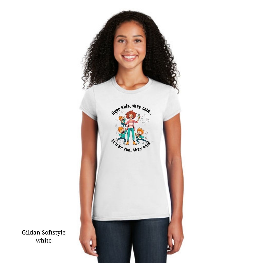 Quirky 'Have Kids They Said, It'll Be Fun They Said' graphic t-shirt featuring a frazzled mom with coffee and kids, in colors like Sport Grey, Azalea, and more, sizes S to 3XL.