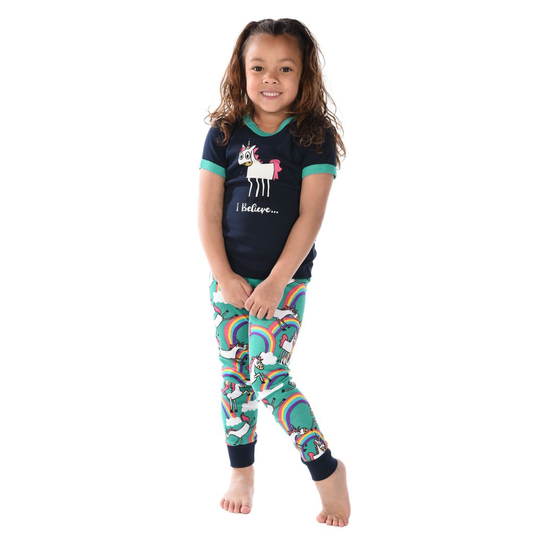 Kids 'I Believe' unicorn PJ set with a short sleeve shirt in Dress Blue and long pants in Turquoise, featuring unicorn and rainbow designs