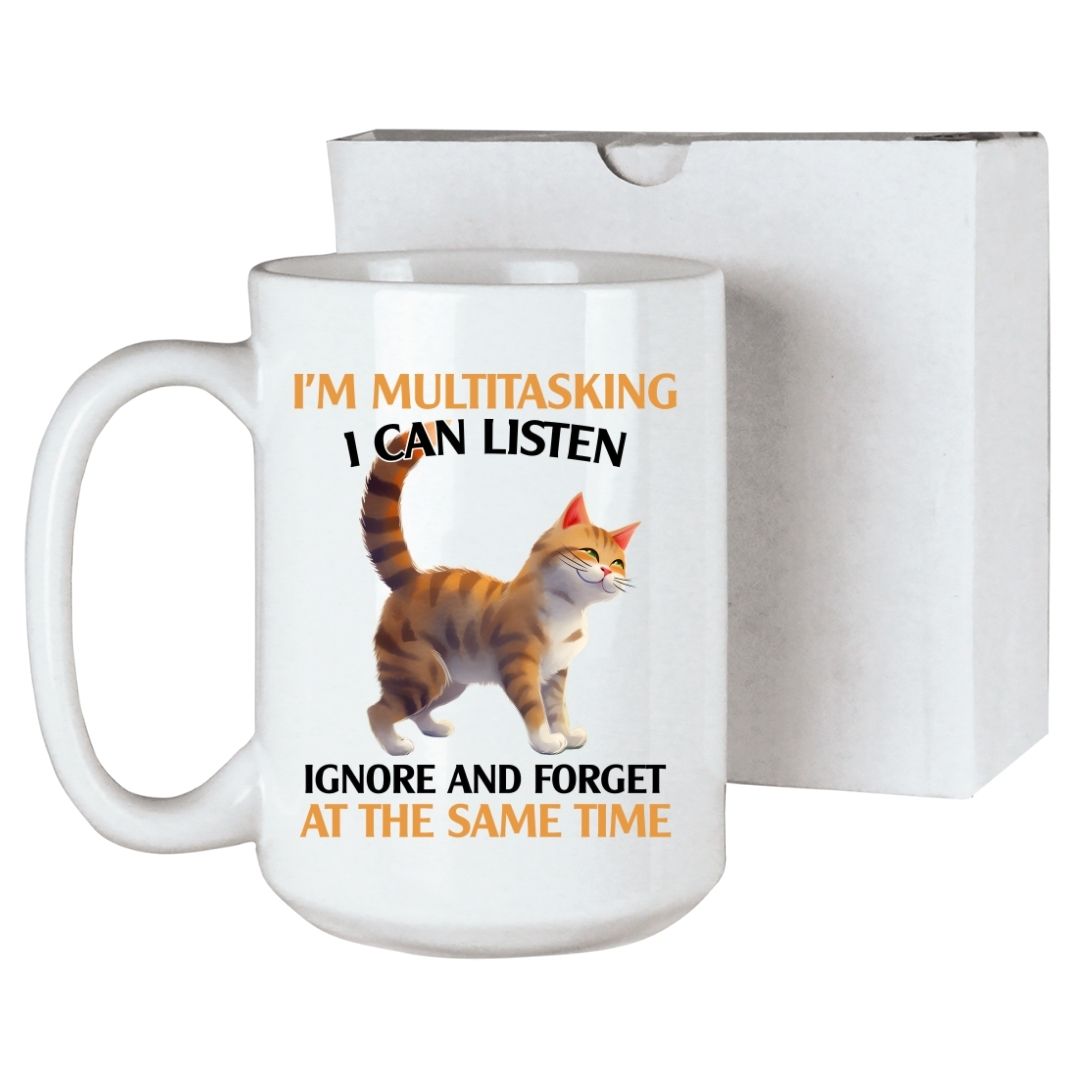 humorous white ceramic coffee mug featuring an orange tabby cat and the quote 'I'm Multitasking, I can listen, ignore and forget at the same time', gift box included