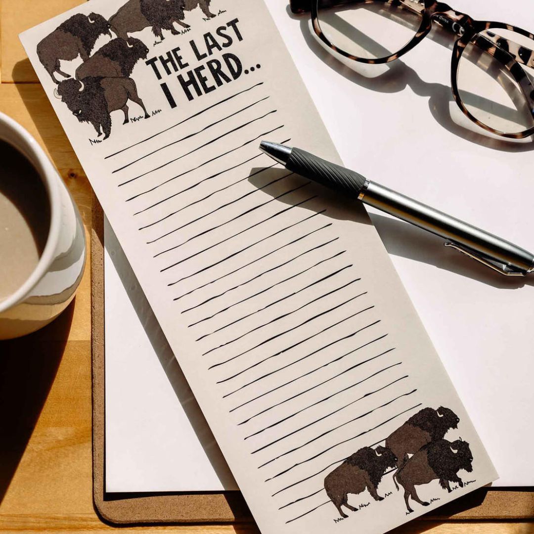 Magnetic list notepad featuring a buffalo herd design, titled 'I Herd That,' with 50 sheets, size 11” x 4.25”