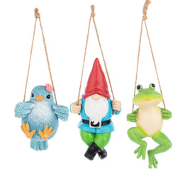 Swinging into the Garden Ornaments featuring a blue bird, a frolicking gnome and a green frog