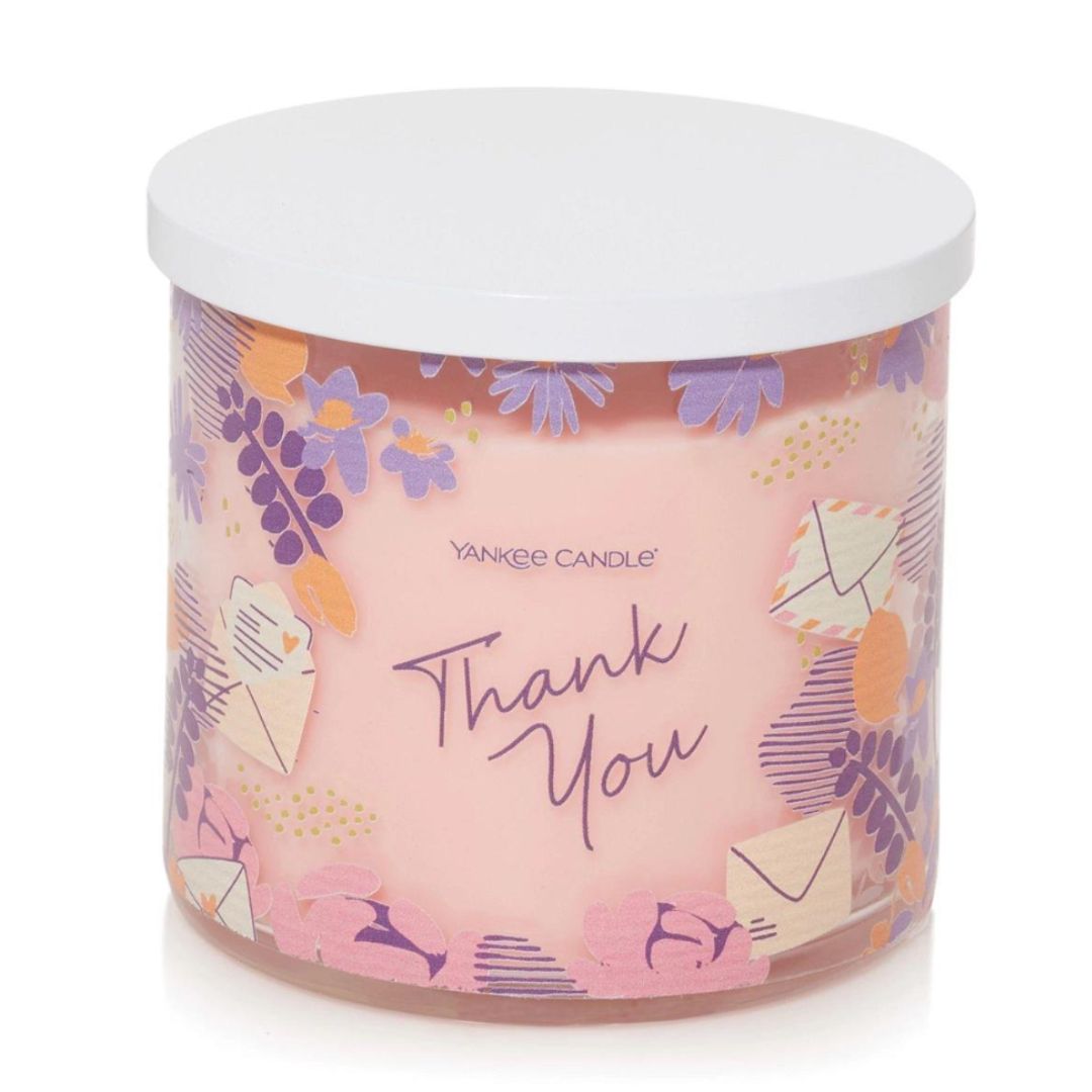 Yankee 3 Wick Candle with Thank You message and a pink sand scent.