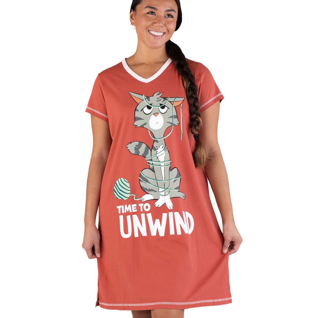 Women's Moab Sunset Pink V-neck nightshirt with 'Time to Unwind' cat wrapped in yarn graphic, made from 100% combed cotton, featuring contrasting neckband
