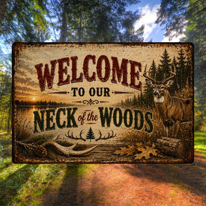 Welcome to Our Neck of the Woods aluminum sign with whitetail deer and rustic woodland lake scene
