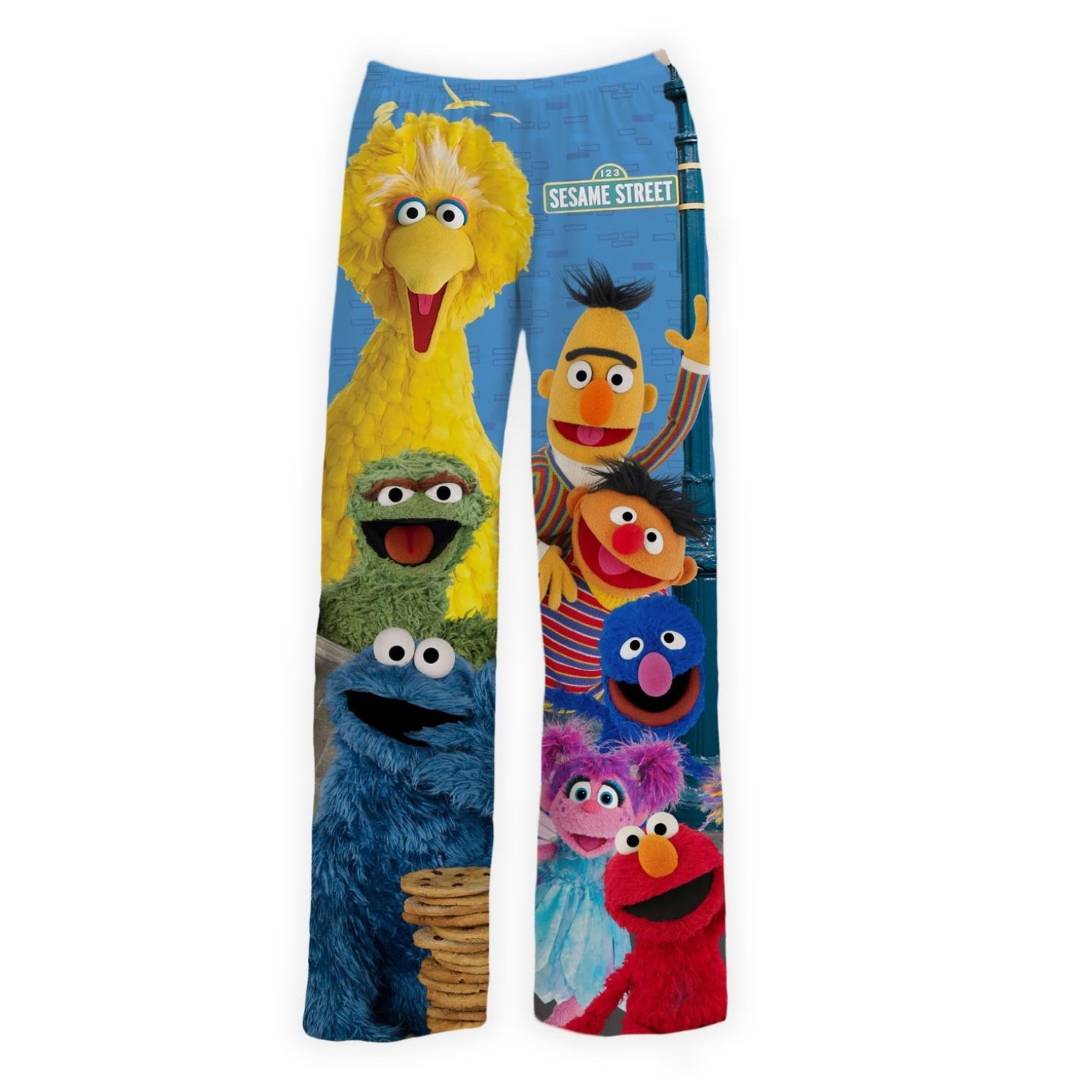 Seasame Street Cast of Characters including big bird, oscar the grouch, cookie monster, bert, ernie, elmo and grover adorn these fun lounge wear pants for kids.