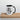 White mug with black interior and handle featuring a vintage-style illustration and text on a wooden surface.