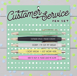 The Customer Service Pen Set includes five pens with funny customer service sayings like 'outward smiles, inward screams' and 'The customer is always wrong.' Pens are displayed in vibrant colors, highlighting the humorous and relatable messages for anyone in customer service.