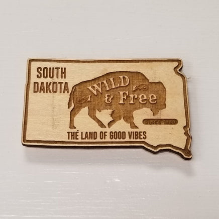 South Dakota wooden lazer engraved magnet featuring a bison wild and free with the land of good vibes etched in the wood