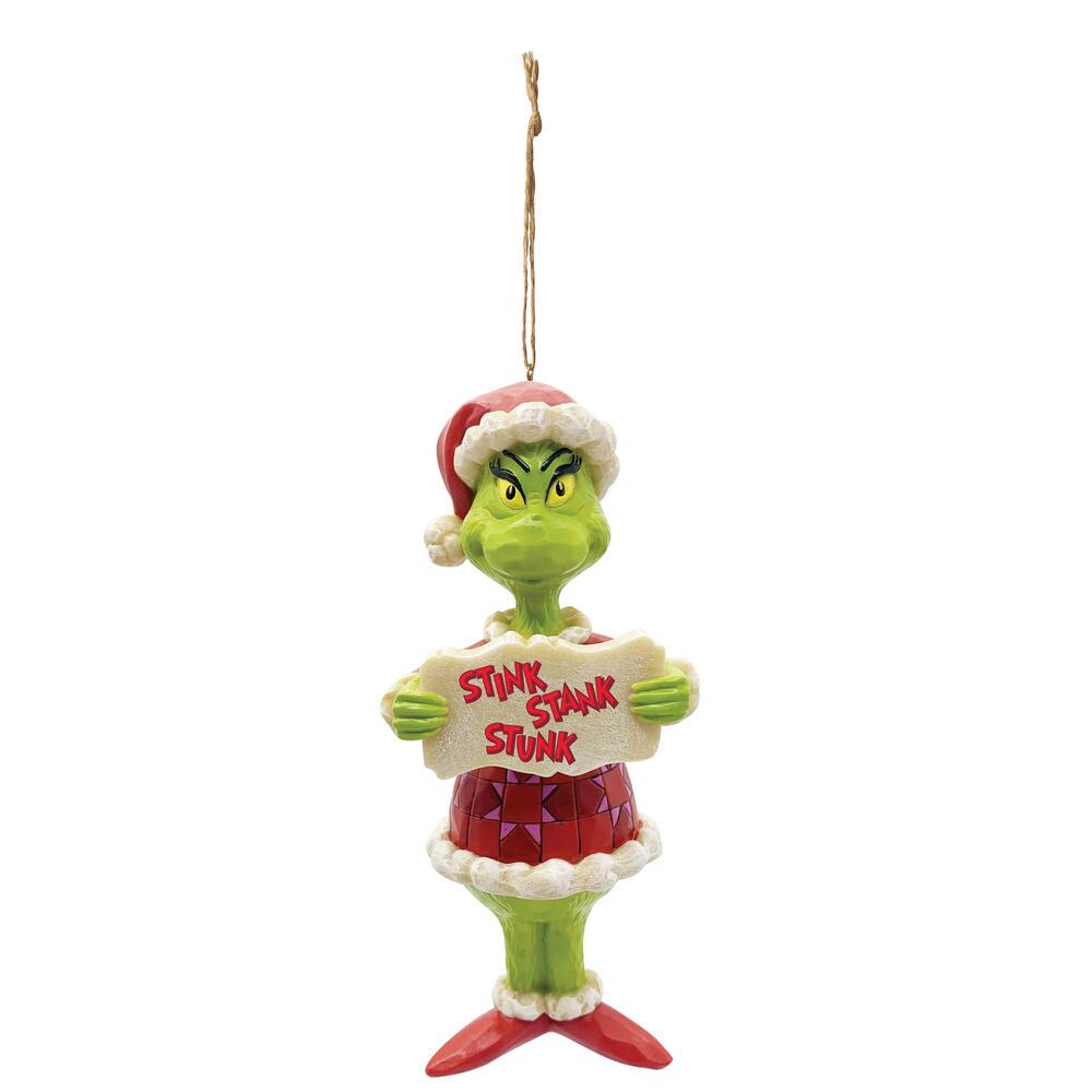 The Grinch dressed in a santa suit holding a stink, stank, stunk sign Christmas hanging ornament for the Dr. Seuss Collection. Designed by Jim Shore for Enesco.