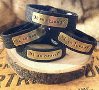 Black leather inspirational bracelets handmade by veteran owned small business