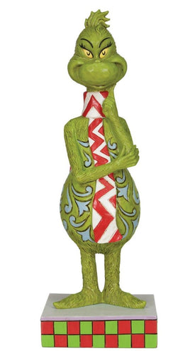 Grinch with long red and white scarf with detailed blue rosemaling by Jim Shore for the Dr Seuss Grinch Collection 9 inches tall.
