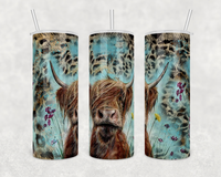Highland cow coffee drink tumbler made of stainless steel with double wall vacuum insulation and comes with clear sliding lid and straw skinny tumbler