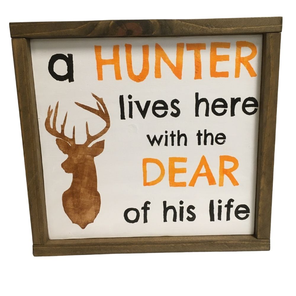 A hunter lives here with the dear of his life wood sign decor
