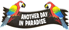 2 parrots sitting on a black wood sign with the words another day in paradise. great home or work office sign. bar sign or beach decor