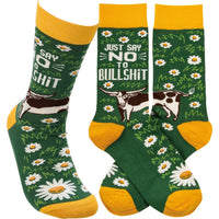 Green and Yellow crew socks with 'Just Say No to Bullshit' sentiment, featuring a black and white long-horned cow and daisy design.